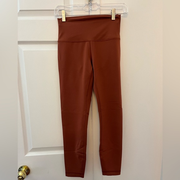 lululemon athletica Pants - Lululemon Wunder Train High Rise Tight 25” in Dark Terracotta